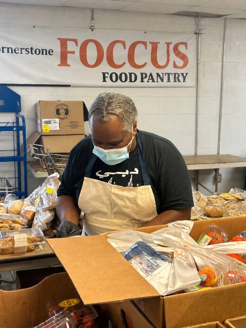 Volunteers sorting food donations at the pantry